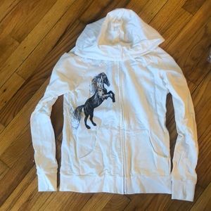 NWOT, white zip up sweater with black horse.
